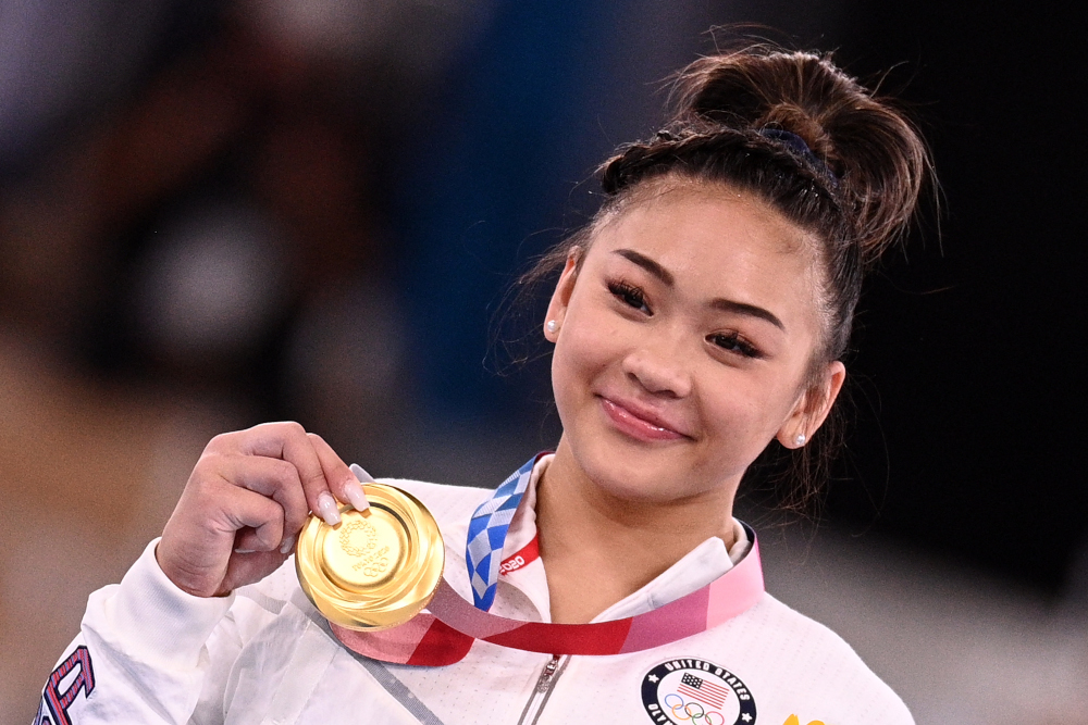 USAu00e2u20acu2122s Sunisa Lee poses with her gold medal during the podium ceremony of the artistic gymnastics womenu00e2u20acu2122s all-around final during the Tokyo 2020 Olympic Games at the Ariake Gymnastics Centre in Tokyo July 29, 2021. u00e2u20acu201d AFP pic 