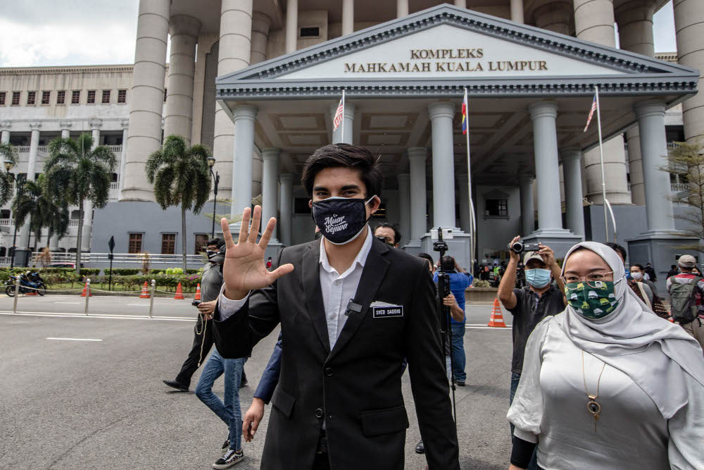 Muar MP Syed Saddiq Syed Abdul Rahman leaves the Kuala Lumpur Court Complex July 22, 2021. u00e2u20acu201d Picture by Firdaus Latif