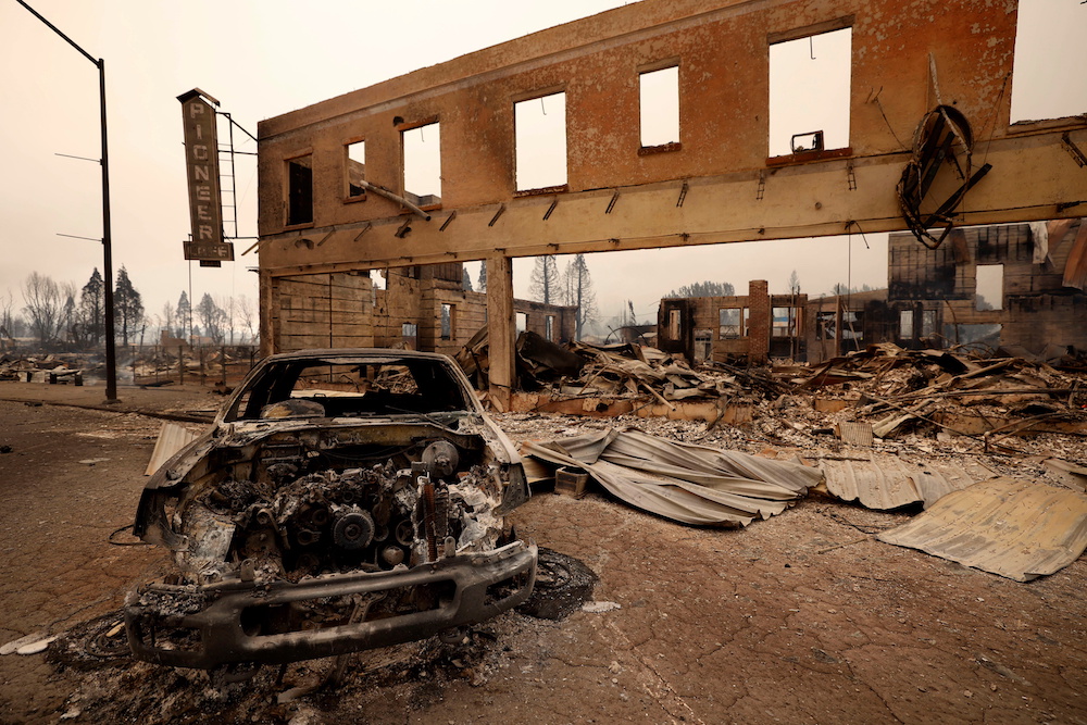 View of a burned out car and commercial building following the Dixie Fire, a wildfire that tore through the town of Greenville, California, US August 5, 2021. u00e2u20acu201d Reuters pic