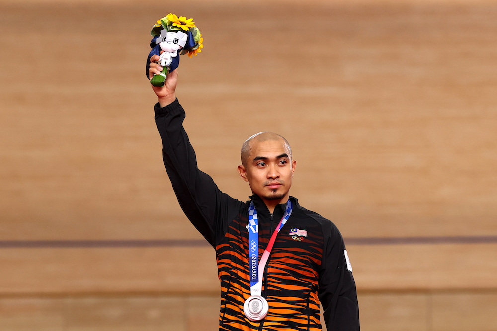 Silver medallist Azizul Hasni Awang of Malaysia reacts after receiving his medal in Shizuoka, Japan August 8, 2021. u00e2u20acu201d Reuters pic
