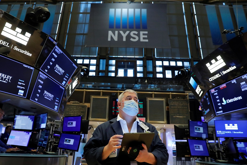 A trader works on the floor at the New York Stock Exchange (NYSE) in Manhattan, New York August 20, 2021. u00e2u20acu201d Reuters pic