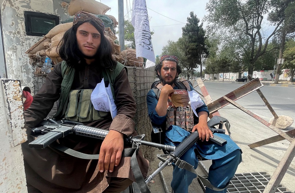 Members of Taliban forces sit at a checkpost in Kabul August 17, 2021. — Reuters pic