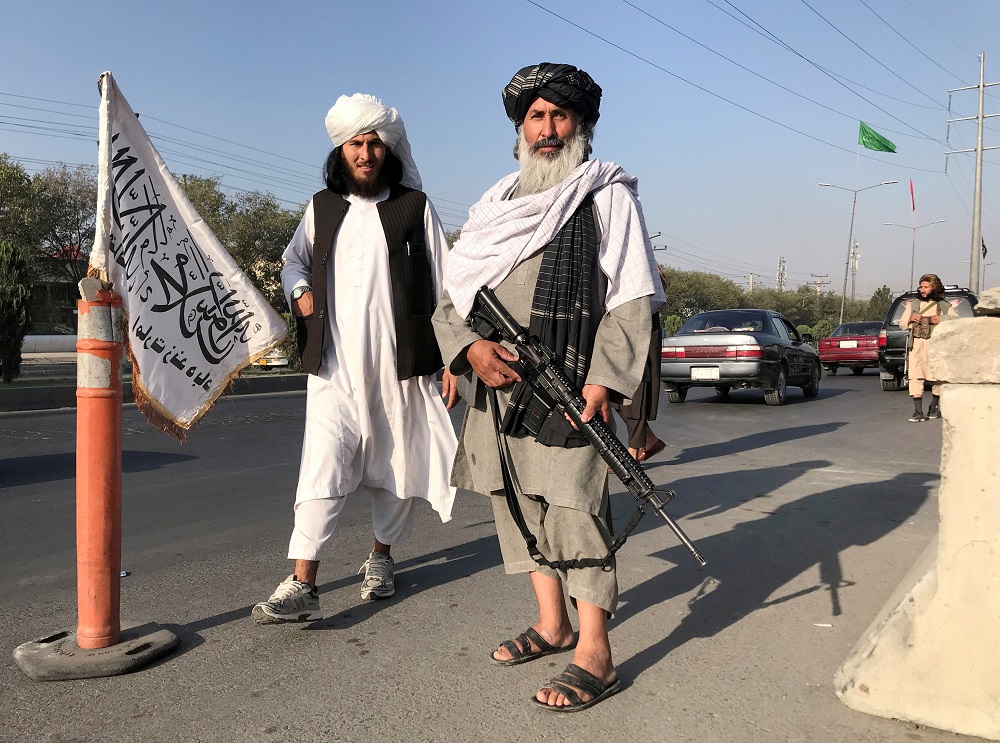 A Taliban fighter holding an M16 assault rifle stands outside the Interior Ministry in Kabul August 16, 2021. u00e2u20acu201d Reuters pic