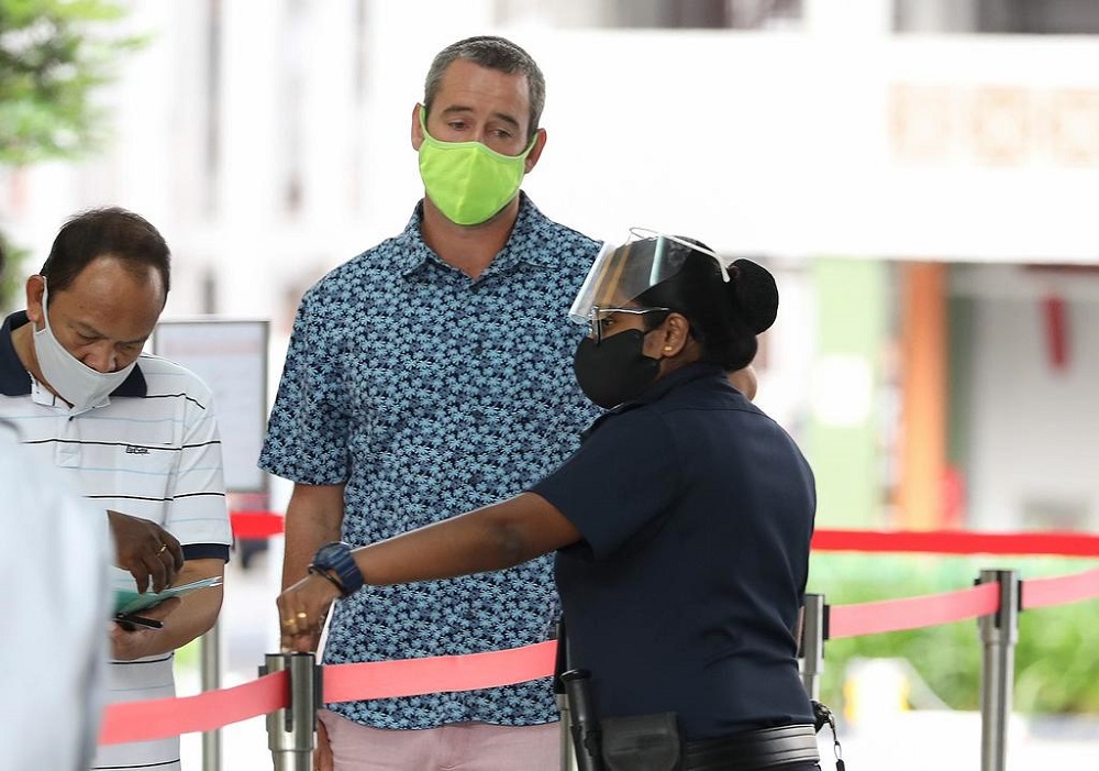 Benjamin Glynn (centre) was deported to his home country in England August 20, 2021. u00e2u20acu201d TODAY pic