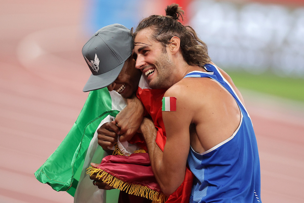 Mutaz Essa Barshim of Qatar and Gianmarco Tamberi of Italy celebrate after winning gold at the Olympic Stadium, Tokyo, Japan August 1, 2021. u00e2u20acu201d Reuters pic
