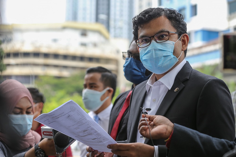 Johor Baru MP Akmal Nasrullah Nasir speaks to reporters outside the Dang Wangi District Police headquarters in Kuala Lumpur August 2, 2021. u00e2u20acu201d Picture by Yusof Mat Isa