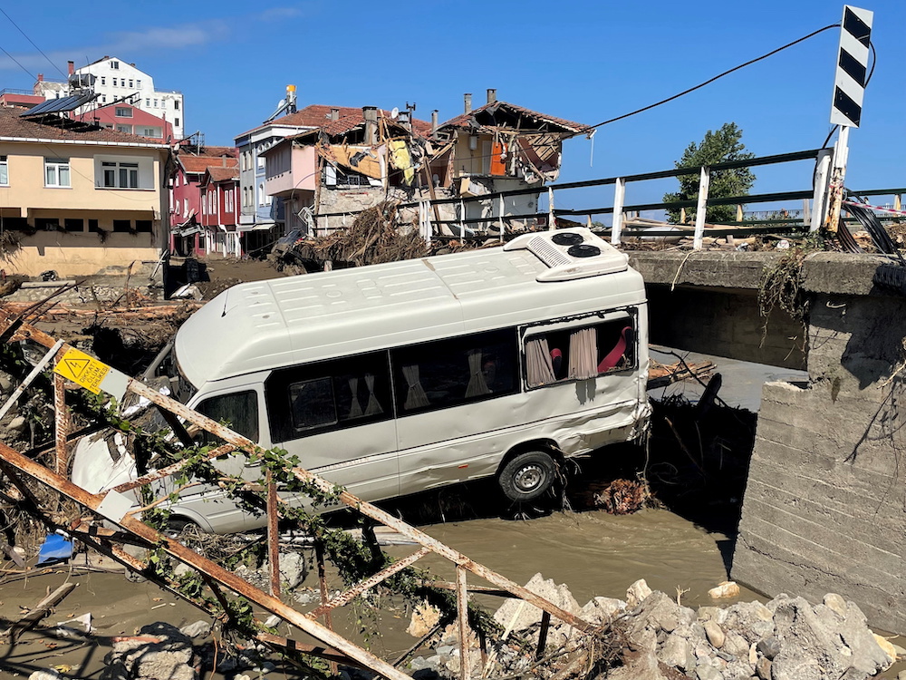 A damaged vehicle and a partially collapsed building are seen following the flash floods that swept through towns in the Turkish Black Sea region, in the town of Ilisi, in Kastamonu province, Turkey, August 15, 2021. u00e2u20acu201d Reuters pic