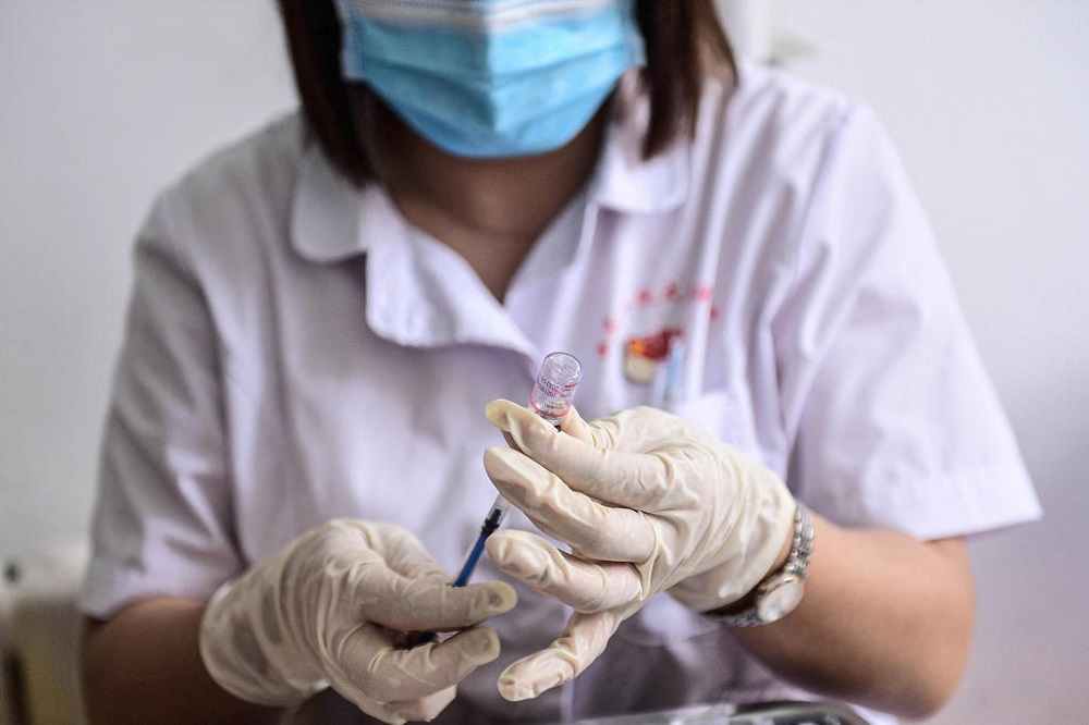 A medical staff member in China preparing a dose of the Sinovac Covid-19 vaccine. u00e2u20acu201d AFP pic