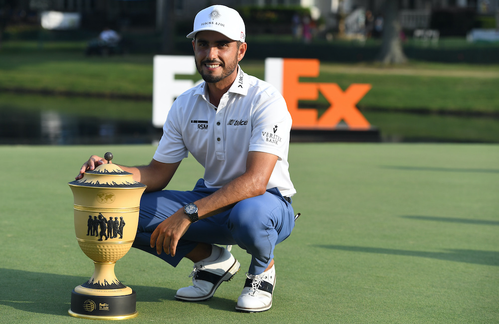 Abraham Ancer poses with the Gary Player Cup after winning WGC FedEx St. Jude Invitational golf tournament at TPC Southwind in a two hole playoff in Memphis, Tennessee, August 9, 2021. u00e2u20acu201dPhoto by Christopher Hanewinckel for USA TODAY Sports (Reuters)nn