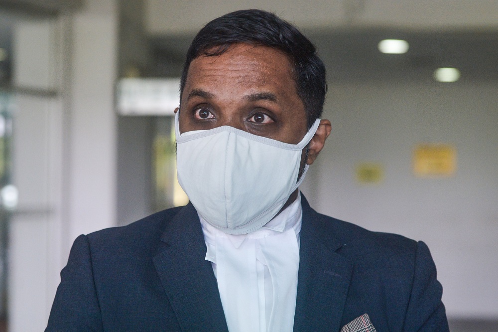 Mohammadhossein Samadi’s lawyer Alex Antion Netto speaks to reporters at the Shah Alam High Court August 24, 2021. ― Picture by Miera Zulyana