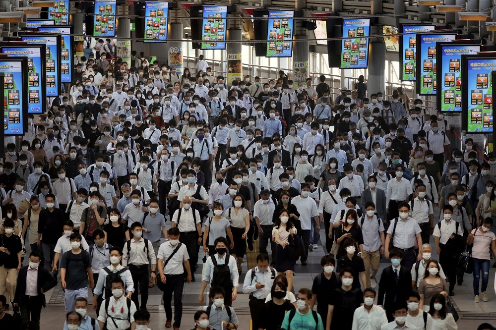 Commuters wearing face masks arrive at Shinagawa Station amid the Covid-19 outbreak, in Tokyo, August 2, 2021. u00e2u20acu2022 Reuters pic