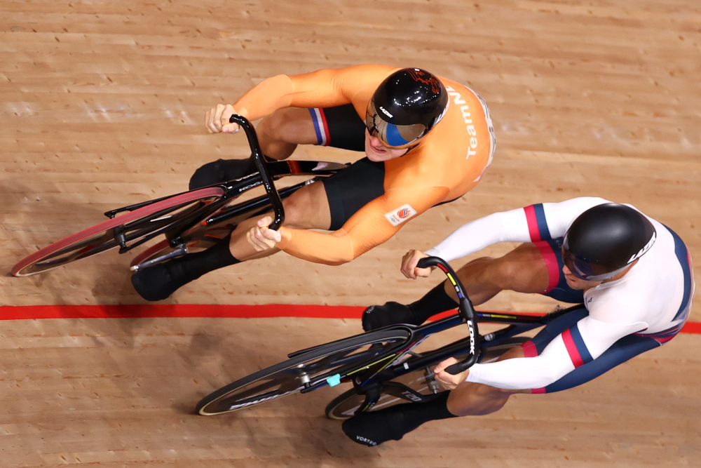Jack Carlin of Britain and Harrie Lavreysen of the Netherlands in action menu00e2u20acu2122s sprint semifinal at  Izu Velodrome, Shizuoka, Japan, August 6, 2021. u00e2u20acu2022 Reuters  picn