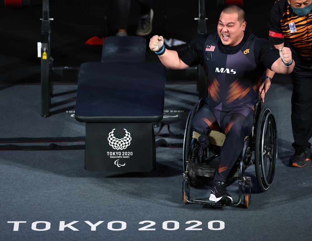 Malaysian powerlifter Jong Yee Khie reacts during the menu00e2u20acu2122s 107kg final at the Tokyo International Forum August 30, 2021. u00e2u20acu201d Reuters picnn