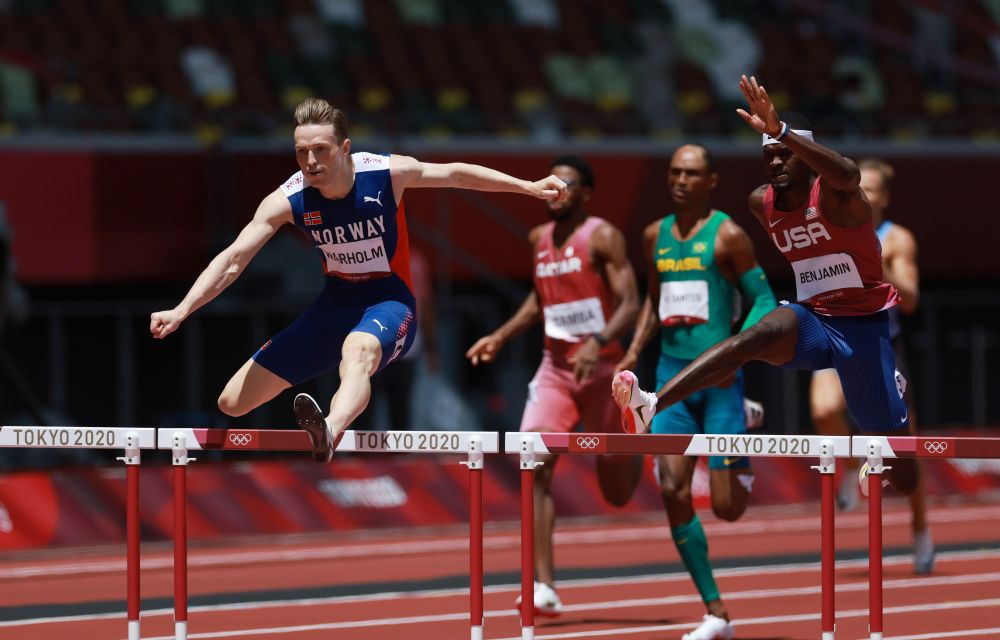 Karsten Warholm of Norway in action on his way to winning gold during the men's 400m hurdles final at the Olympic Stadium, Tokyo August 3, 2021. u00e2u20acu2022 Reuters pic