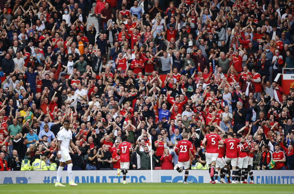 Manchester Unitedu00e2u20acu2122s Bruno Fernandes celebrates scoring their third goal with teammates during the match with Leeds at the Old Trafford in Manchester, August 14 2021. u00e2u20acu201d Reuters pic