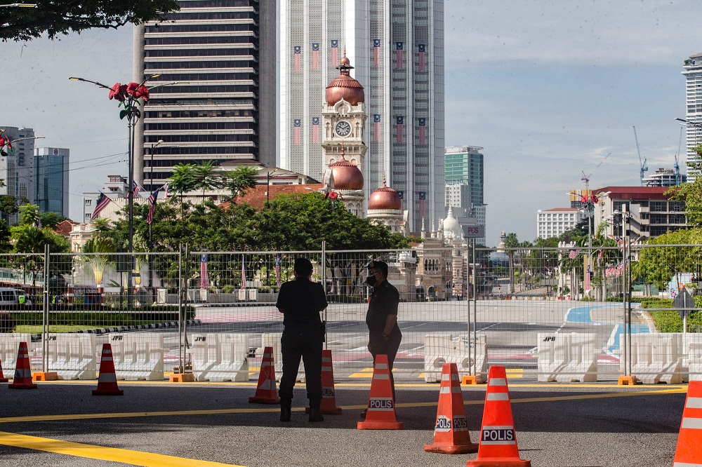 Police cordoned off entry into Dataran Merdeka in Kuala Lumpur August 21, 2021. u00e2u20acu2022 Picture by Firdaus Latif