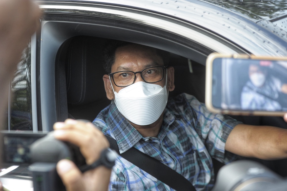 A vehicle believed to be ferrying Special Advisor to the Prime Minister, Ahmad Faizal Azumu is seen arriving at Prime Minister Tan Sri Muhyiddin Yassinu00e2u20acu2122s residence in Bukit Damansara August 14, 2021. u00e2u20acu201d Picture by Shafwan Zaidon nn