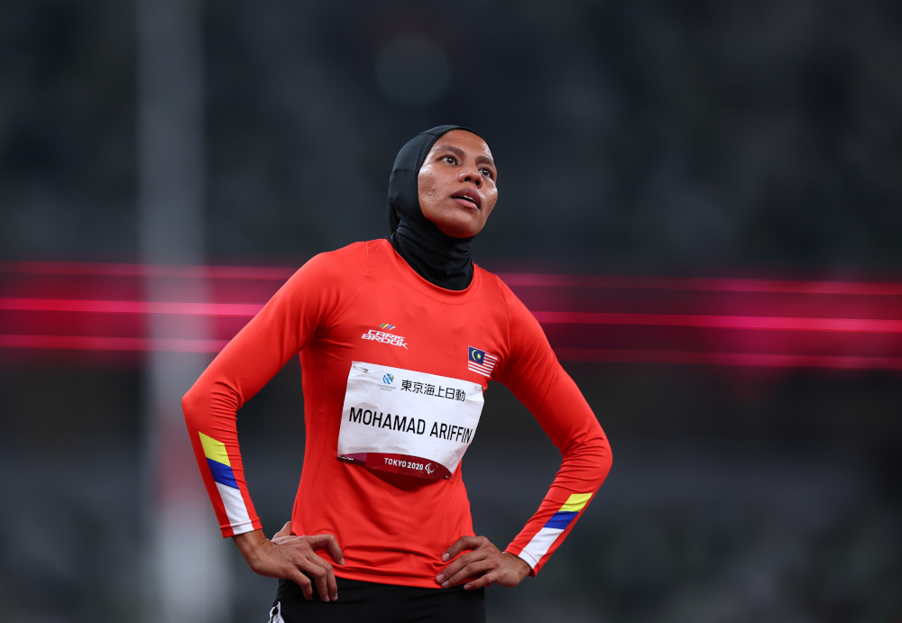 Siti Noor Iasah Mohamad Ariffin of Malaysia reacts after competing in the Womenu00e2u20acu2122s 400m T20 Round 1, Heat 2 at the Olympic Stadium, Tokyo, Japan, August 30, 2021. u00e2u20acu201d Reuters pic 