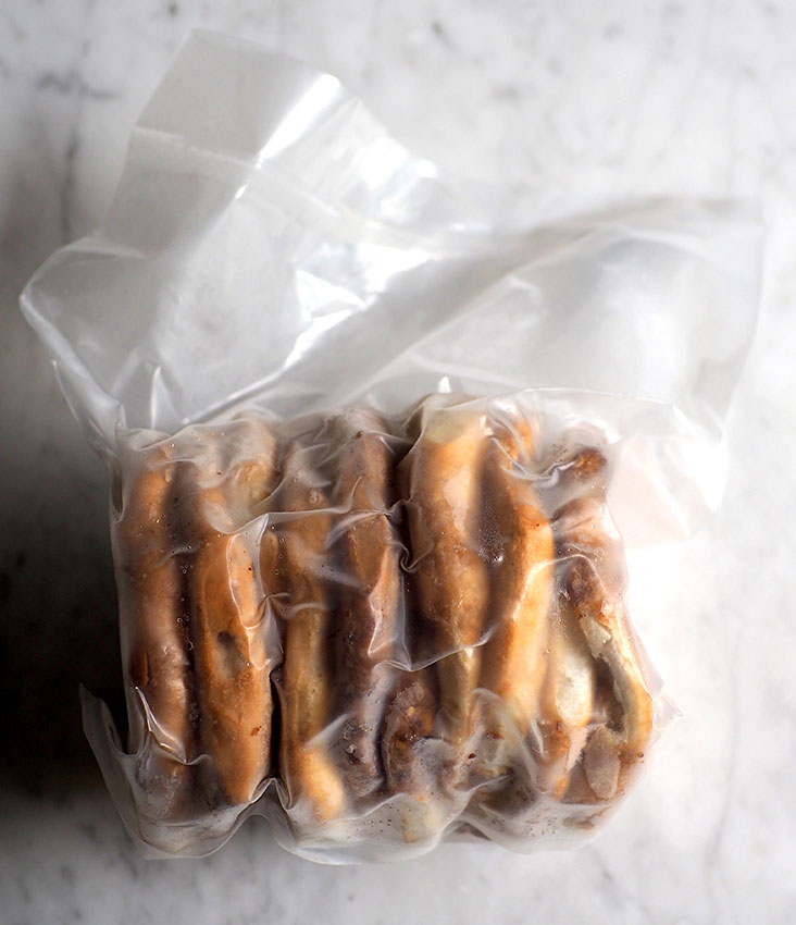 The frozen 'gong pia' is vacuum packed and can be heated up in an oven to its crackly goodness