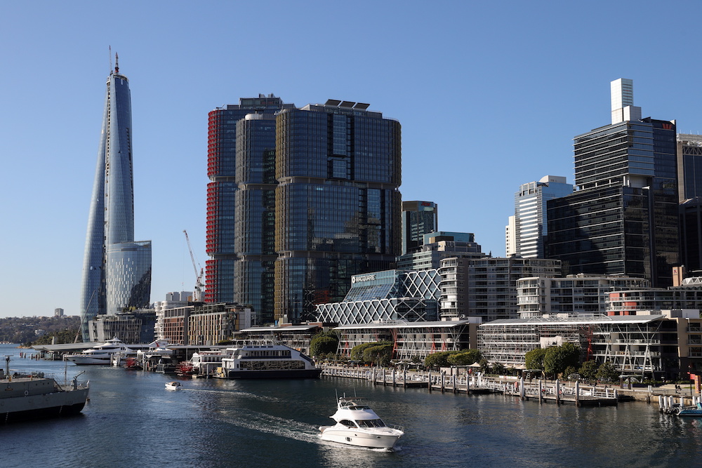 A boat navigates Darling Harbour past the Central Business District waterfront in Sydney, Australia. August 28, 2020. u00e2u20acu201d Reuters picnn