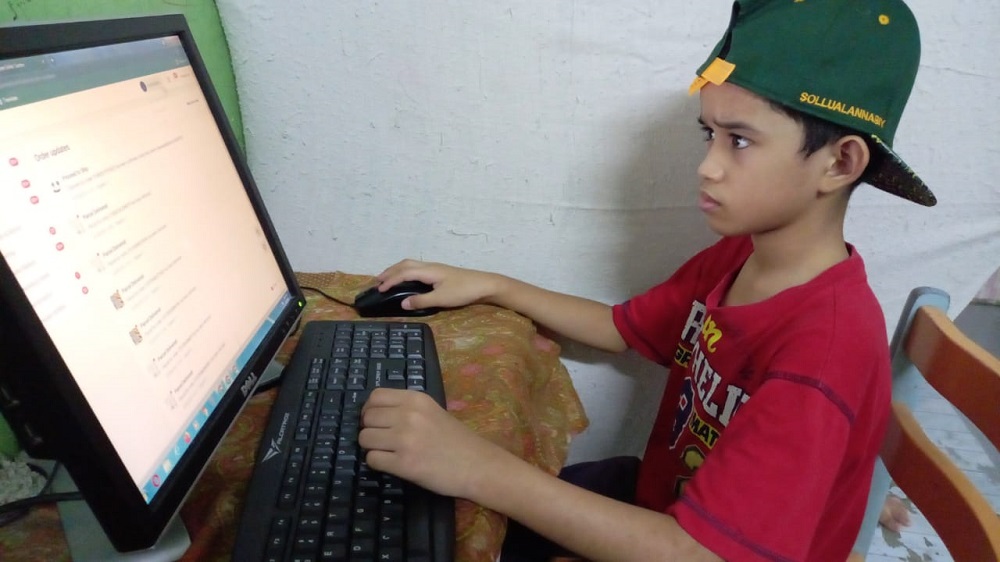 An 11-year-old Shopee seller who went viral recently is trying to raise money to buy himself a new phone so that he could join his Teaching and Learning at Home (PdPR) classes. u00e2u20acu2022 Picture courtesy of Nurul Huda