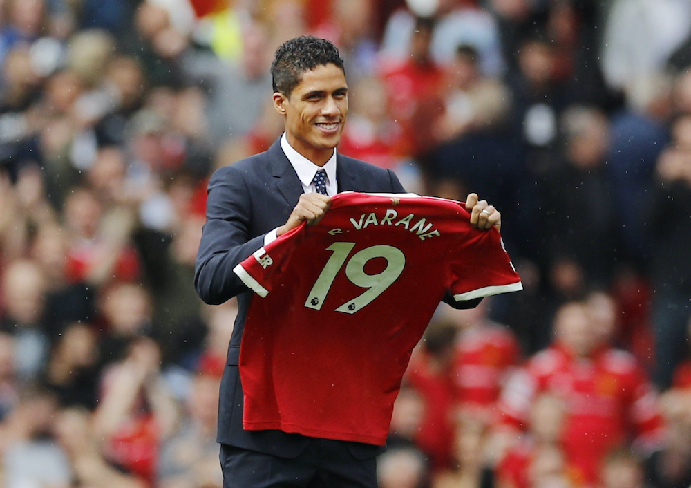Manchester Unitedu00e2u20acu2122s Raphael Varane is presented to fans before the match at the Old Trafford in Manchester, August 14, 2021. u00e2u20acu201d Reuters picnnn