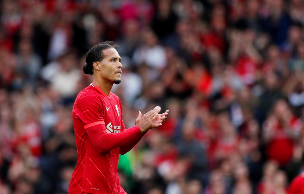 Liverpoolu00e2u20acu2122s Virgil van Dijk applauds the fans as he is substituted during a match with Athletic Bilbao at Anfield, August 8, 2021. u00e2u20acu201d Action Images pic via Reuters