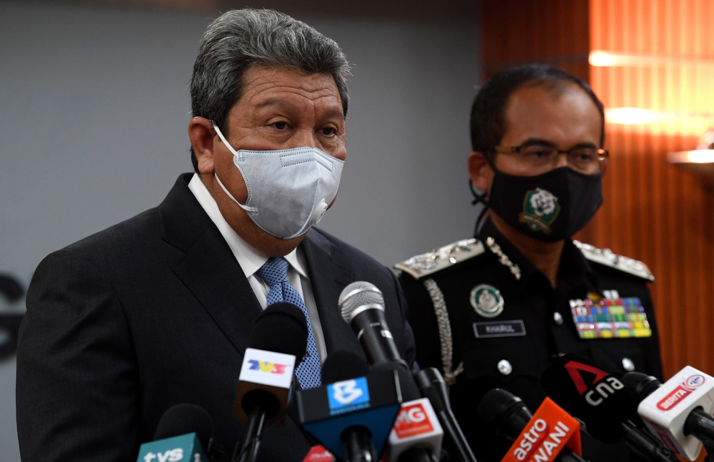 Home Ministry secretary-general Datuk Wan Ahmad Dahlan Abdul Aziz speaks at a media conference on the Malaysia My Second Home programme in Putrajaya, August 11, 2021. With him is Immigration director-general Datuk Khairul Dzaimee Daud. u00e2u20acu2022 Bernama pic 