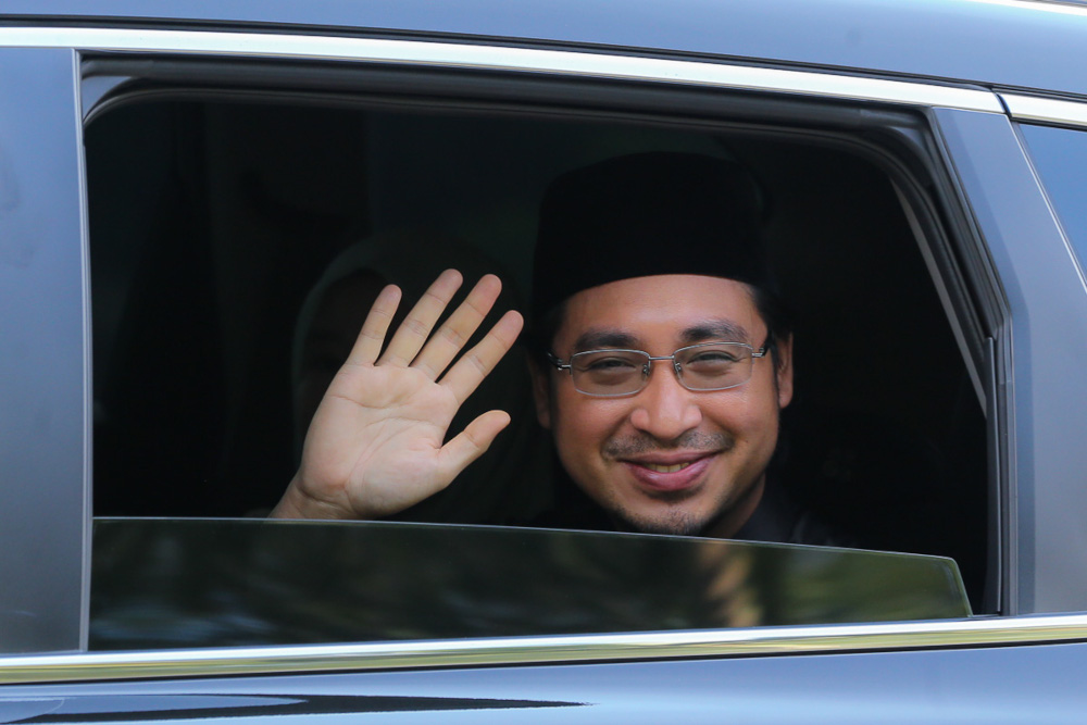 Deputy National Unity Minister Wan Ahmad Fayshal Wan Ahmad Kamal waves as he leaves Istana Negara after taking his oath of office in Kuala Lumpur, August 30, 2021. u00e2u20acu201d Picture by Yusof Mat Isa