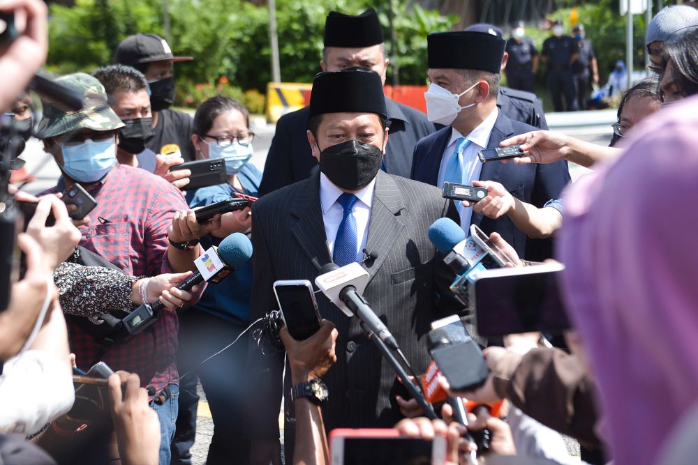 Umno secretary-general Datuk Seri Ahmad Maslan speaks to reporters before leaving Istana Negara in Kuala Lumpur August 19, 2021. u00e2u20acu201d Picture by Miera Zulyana