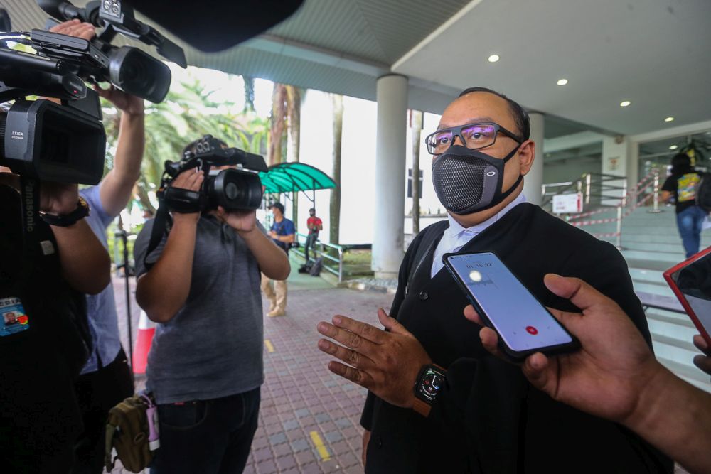 Datuk Seri Ahmad Zahid Hamidi's lawyer Hamidi Mohd Noh speaks to reporters at the Shah Alam High Court August 25, 2021. — Picture by Yusof Mat Isa