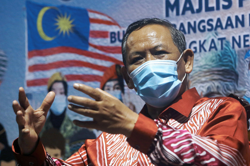 Negri Sembilan Mentri Besar Datuk Seri Aminuddin Harun speaks at the launch of the state-level National Month and Fly the Jalur Gemilang campaign at Auditorium Raja Melewar in Seremban, August 12, 2021. u00e2u20acu201d Bernama pic 