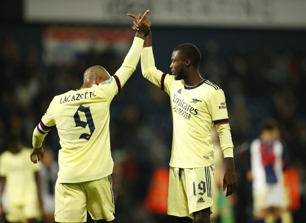 Arsenal's Alexandre Lacazette and Nicolas Pepe celebrate after the game against West Bromwich Albion at The Hawthorns, West Bromwich August 25, 2021. u00e2u20acu201d Reuters picnn