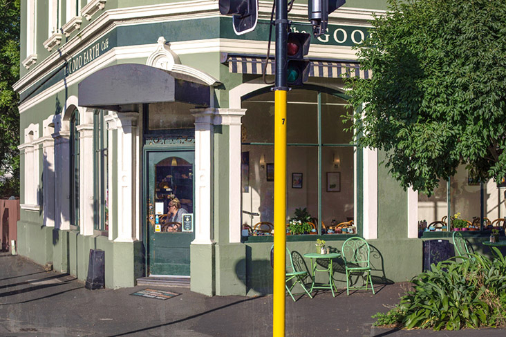 The sunlit entrance to The Good Earth Café.