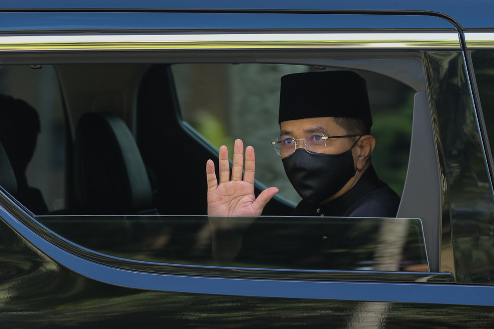 International Trade and Industry Minister Datuk Seri Mohamed Azmin Ali waves as he leaves Istana Negara after taking his oath of office, loyalty and secrecy in Kuala Lumpur August 30, 2021. u00e2u20acu201d Picture by Yusof Mat Isa