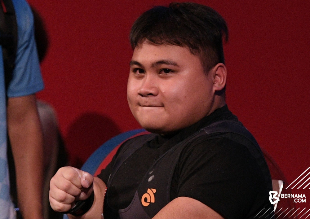 National paralympic powerlifter athlete Bonnie Bunyau Gustin wins the first gold medal for the 72kg category during the Tokyo 2020 Paralympic Games at the Tokyo International Forum August 28, 2021. u00e2u20acu201d Bernama pic