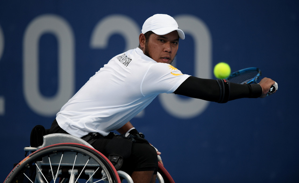 Malaysiau00e2u20acu2122s wheelchair tennis player Abu Samah Borhan responding to a serve from his opponent Gil Jose Pablo of Costa Rica at the Tokyo 2020 Paralympic Games at Ariake Tennis Centre Court August 27, 2021. u00e2u20acu201d Bernama pic