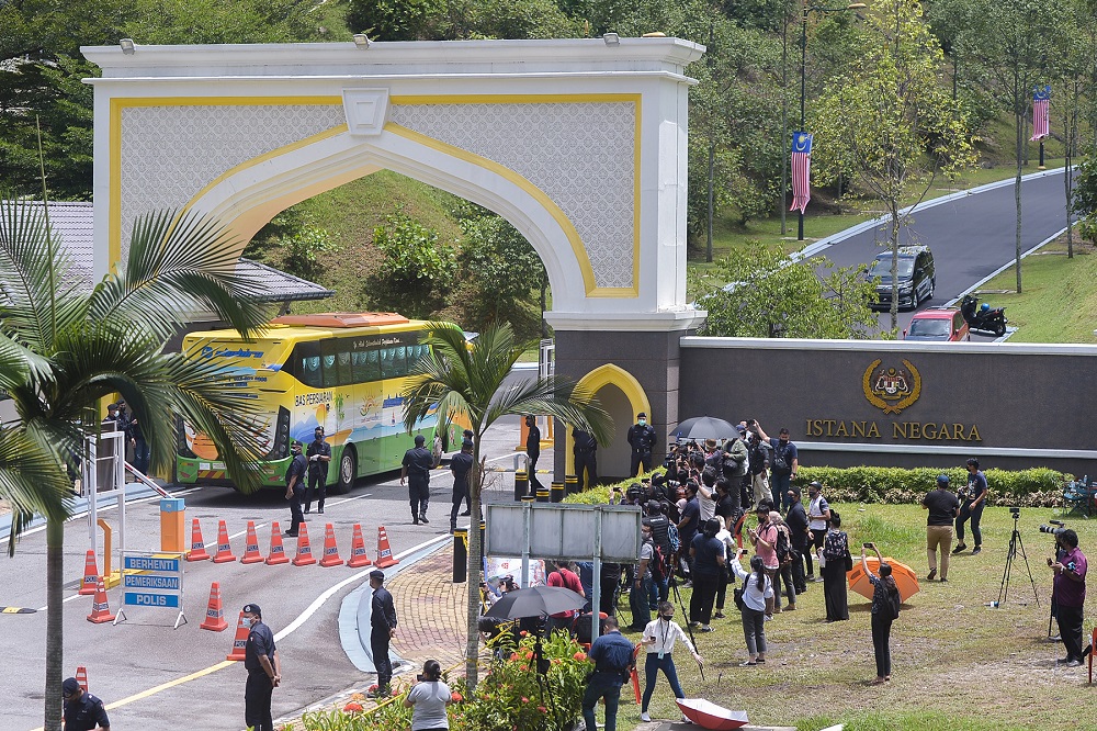A bus ferrying Bersatu MPs is seen arriving at the Istana Negara in Kuala Lumpur on August 19, 2021. u00e2u20acu201d Picture by Miera Zulyana