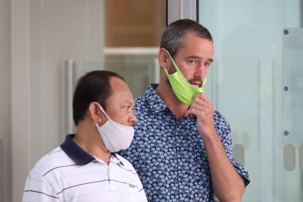 Benjamin Glynn (right) outside the the State Courts on July 2, 2021. u00e2u20acu201d TODAY pic