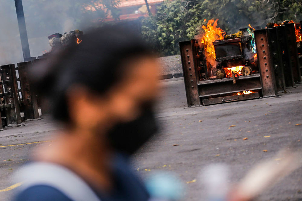 An Indian cremation ceremony is carried out during the Covid 19 pandemic at Sentul Hindu Crematorium, August 8, 2021. u00e2u20acu2022 Picture by Hari Anggara
