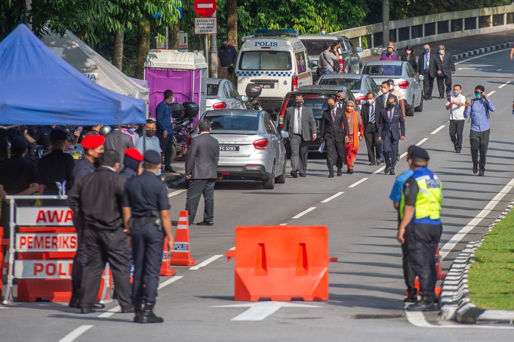 Opposition senators are pictured after marching to the Parliament building to hand a memorandum to Dewan Negara secretary Muhd Sujairi Abdullah on August 3, 2021. ― Picture by Shafwan Zaidon