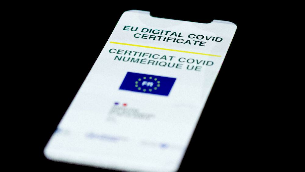A picture taken on July 4, 2021 in Paris shows a mobile phone whose screen bears a EU Digital Covid certificate. u00e2u20acu201d AFP pic