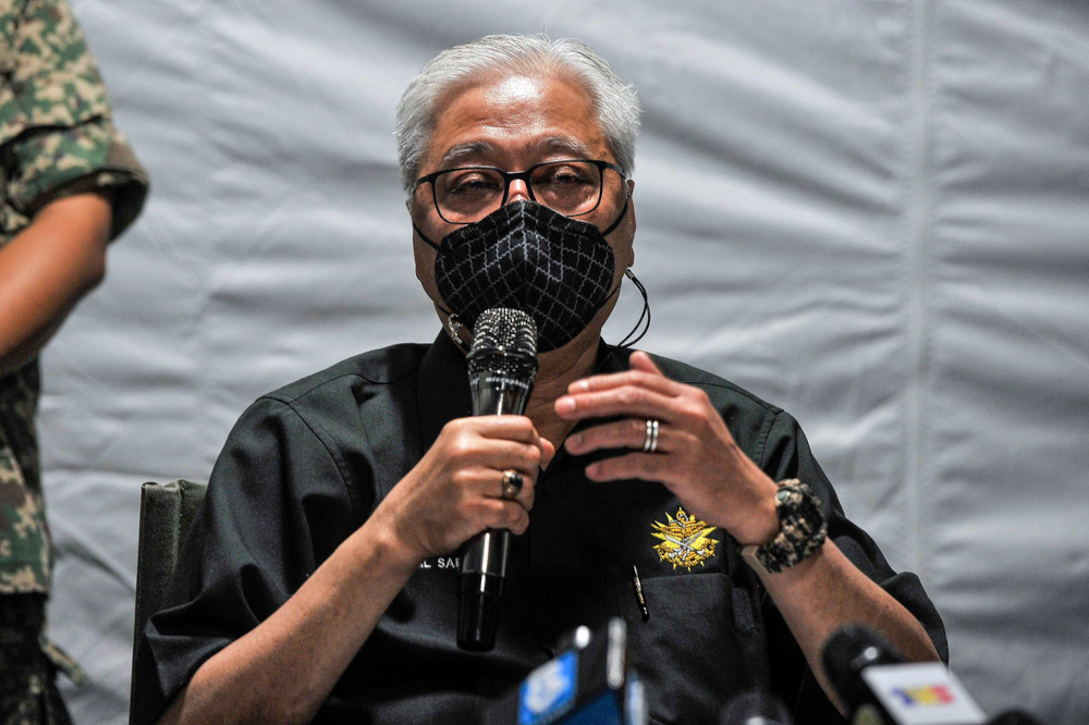 Deputy Prime Minister Datuk Seri Ismail Sabri Yaakob speaks to reporters after visiting the Malaysia Agro Exposition Park Integrated Quarantine and Treatment Centre 2.0 in Serdang, August 6, 2021. u00e2u20acu2022 Bernama pic 