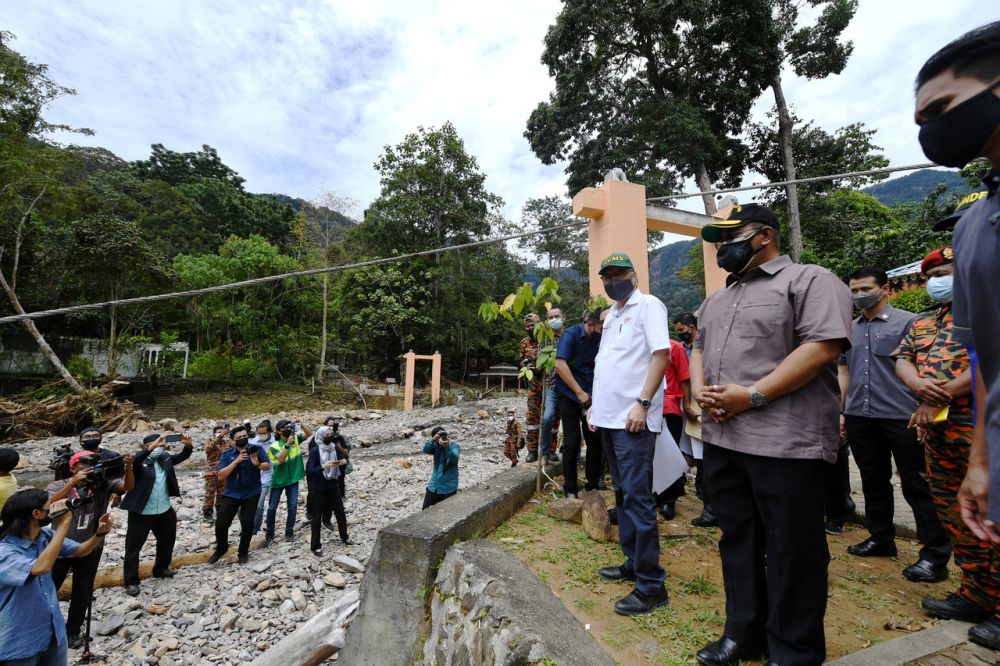 Prime Minister Datuk Seri Ismail Sabri Yaakob is pictured during a working visit to flood-hit Yan, Kedah August 23, 2021. u00e2u20acu201d Bernama pic