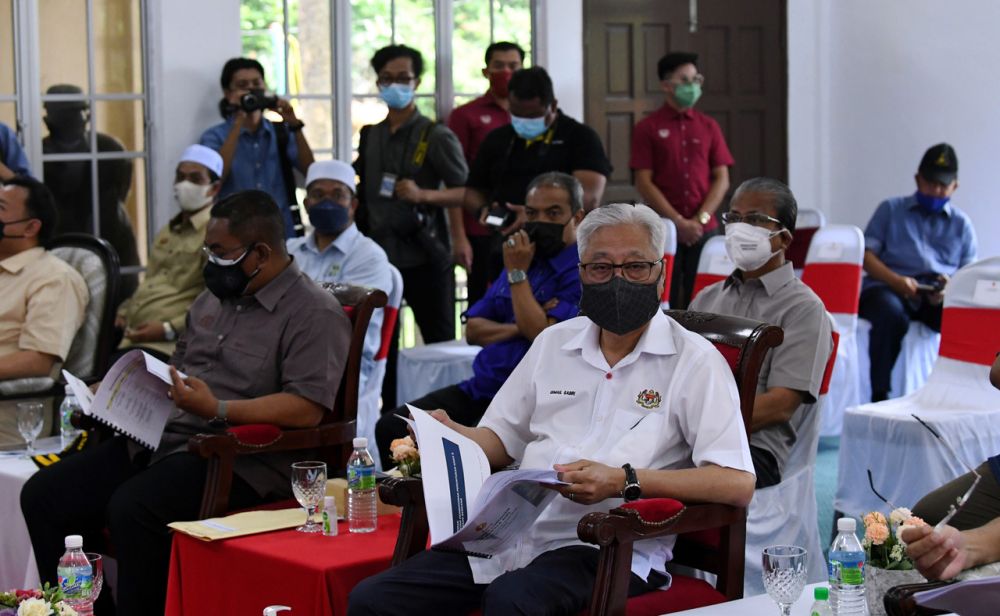 Prime Minister Datuk Seri Ismail Sabri Yaakob is pictured during a briefing on search and rescue efforts for the missing in Titi Hayun, Yan August 23, 2021. u00e2u20acu201d Bernama pic
