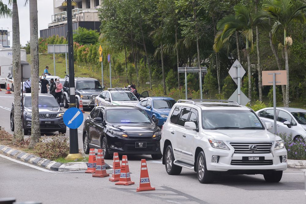 A motorcade escorting Umno president Datuk Seri Ahmad Zahid Hamid arrives at Istana Negara in Kuala Lumpur August 17, 2021. u00e2u20acu201d Picture by Miera Zulyana