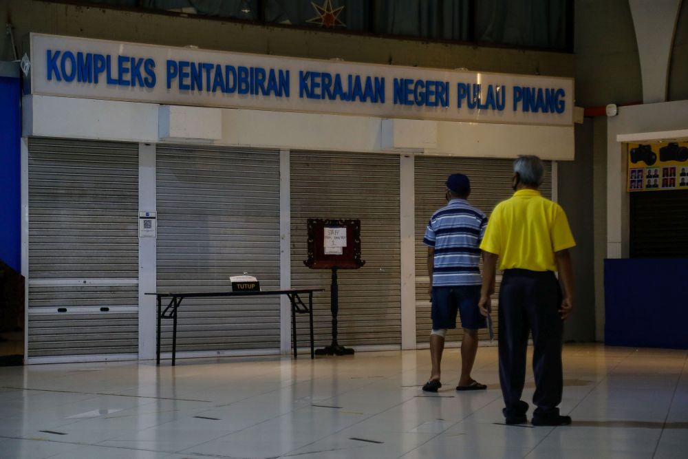 A notice informing the public of the Penang state government offices' closure  is pictured at Komtar, George Town August 12, 2021. u00e2u20acu201d Picture by Sayuti Zainudin