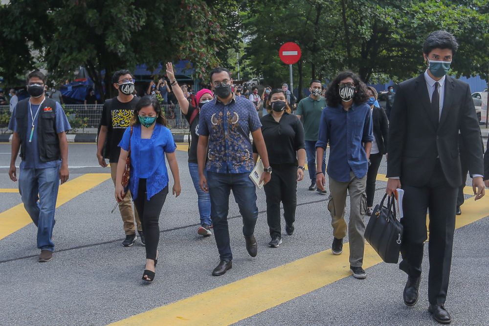 #Lawan rally participants arrive to give their statements at the Dang Wangi district police headquarters in Kuala Lumpur August 2, 2021. u00e2u20acu201d Picture by Yusof Mat Isa