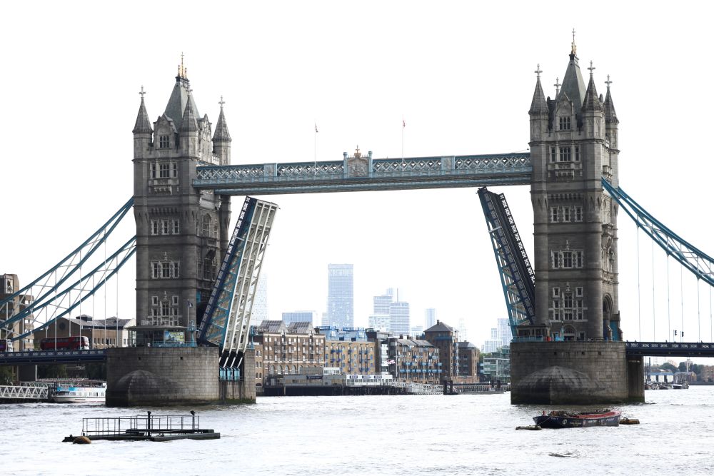 Tower Bridge is seen stuck in the open position, due to a technical fault, in London, Britain, August 9, 2021. u00e2u20acu2022 Reuters pic