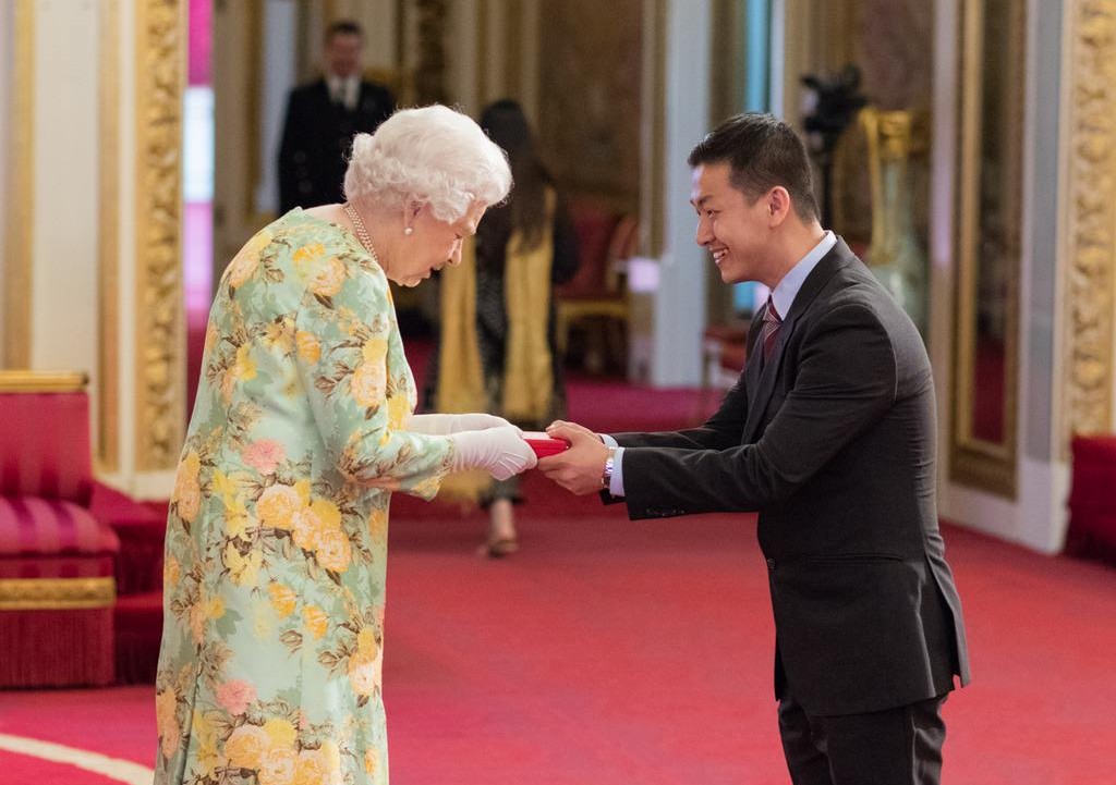 Matt Oon (right) meeting Queen Elizabeth II when he received the Queen’s Young Leader’s Award in 2018. — Photo by Matt Oon